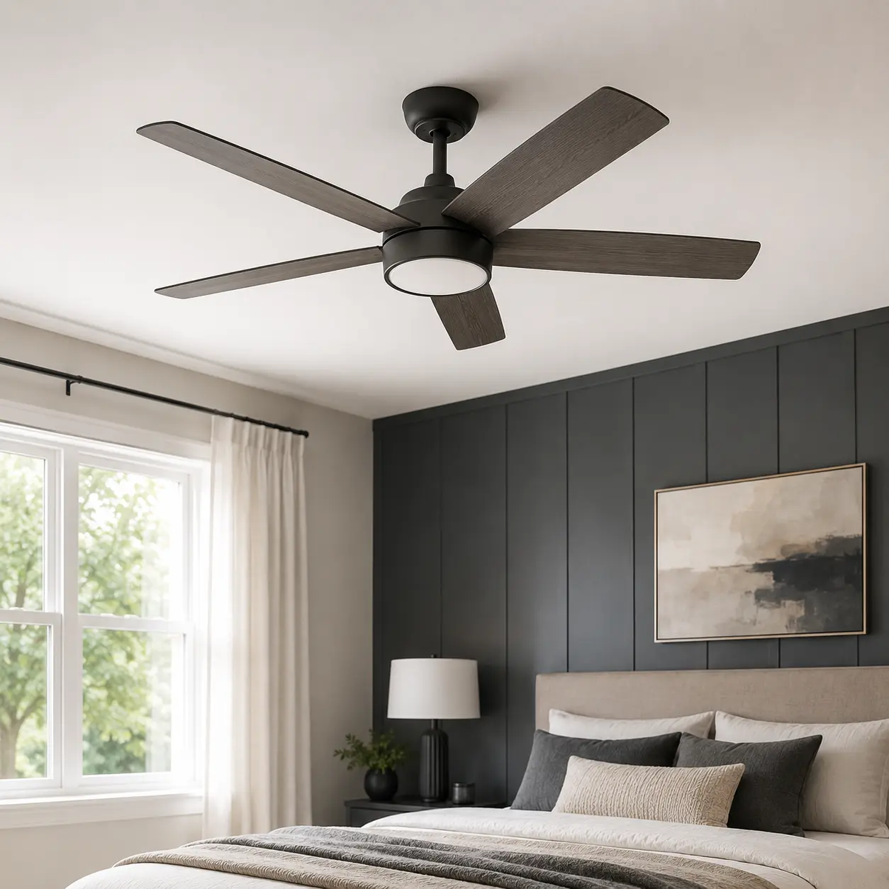 Modern ceiling fan with integrated light in a bedroom