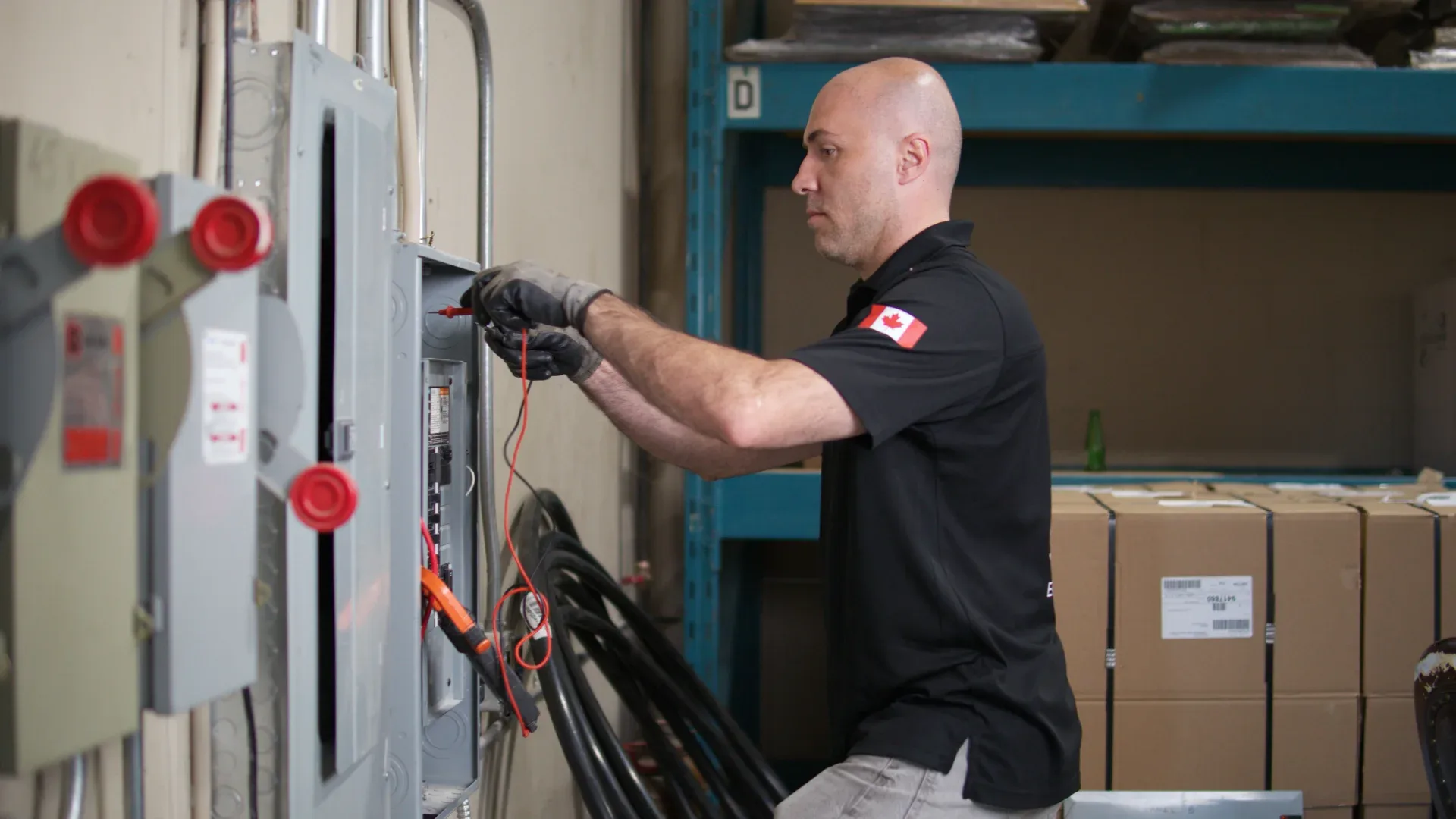 electrician inspecting an electrical panel