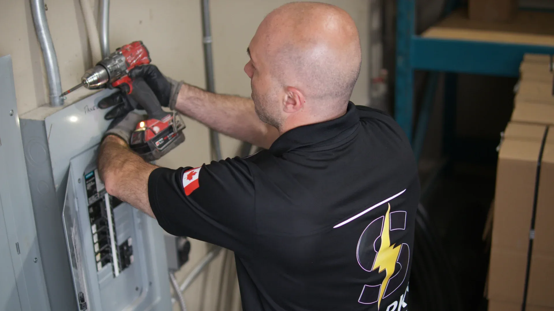 Electrician working on a electrical panel