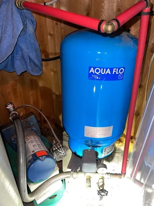 Well pump and water pressure tank system